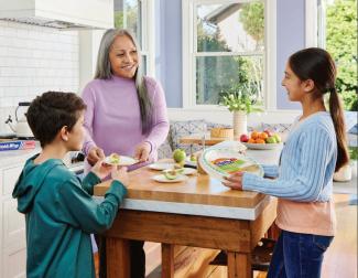 Reynolds Consumer Products – family time with Asian American grandmother having a snack with her pre-teen granddaughter and middles-school grandson using Hefty Ecosave plates